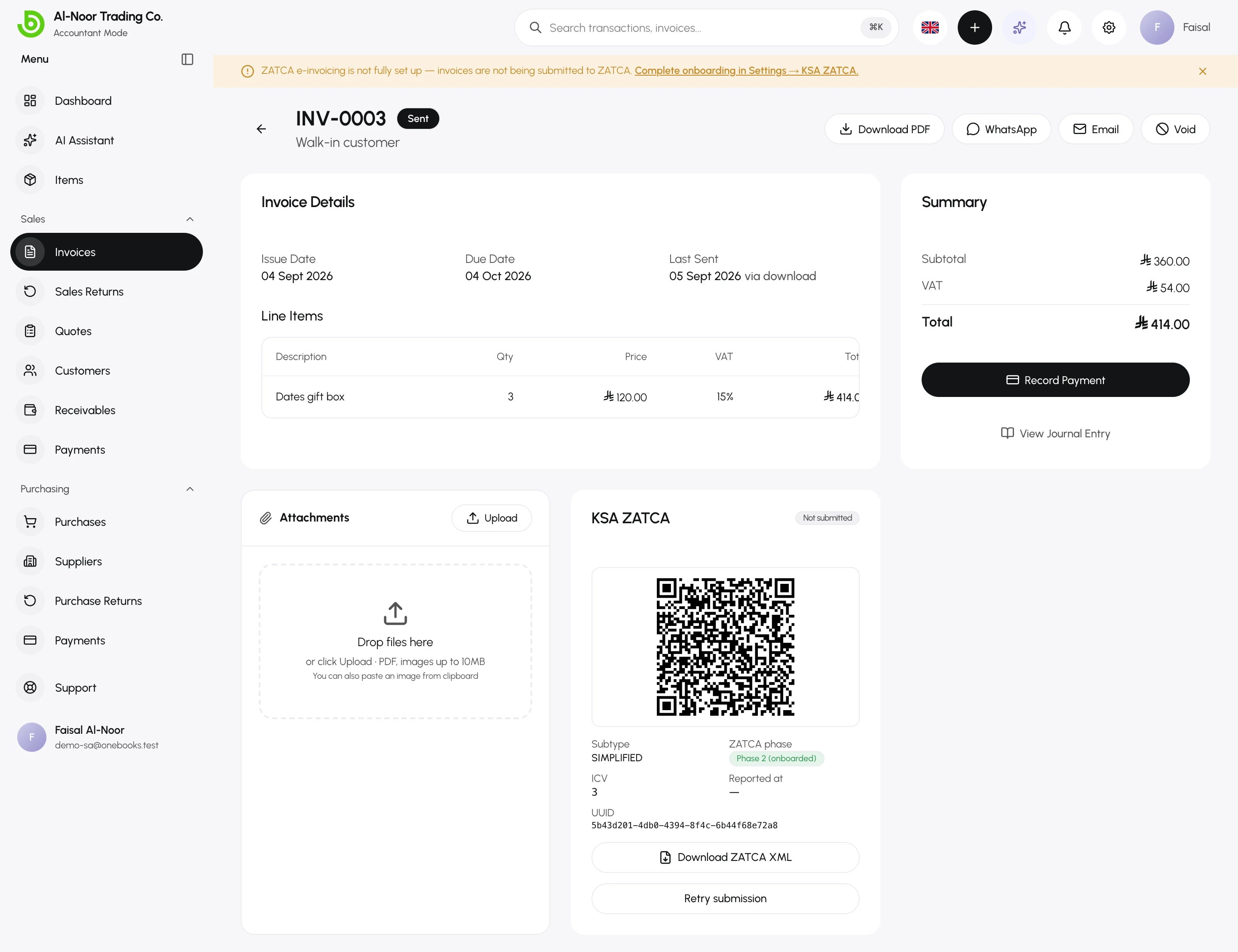 The full invoice page including the ZATCA submission panel and QR code